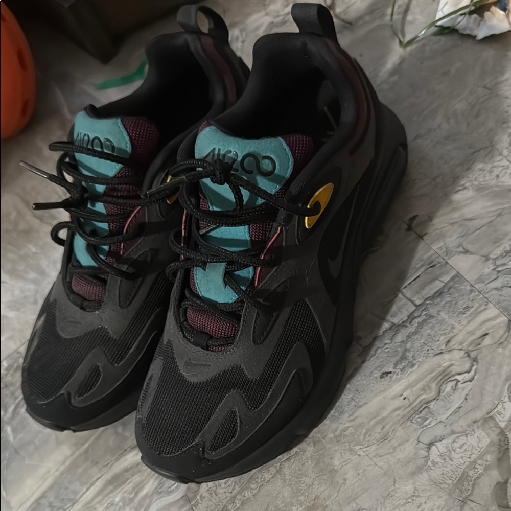 Nike Black and Teal Athletic Shoes with Maroon Highlights